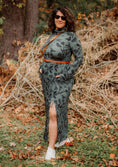 Load image into Gallery viewer, Woman in a patterned dress standing in a forest setting