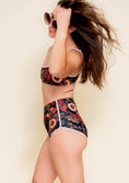 Load image into Gallery viewer, Woman wearing a floral bikini set against a plain background
